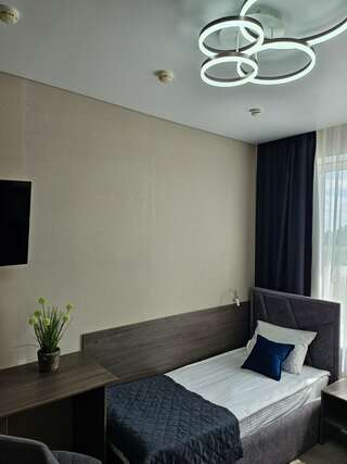 Гостиница Итиль Переволоки Стандартный трехместный номер-5