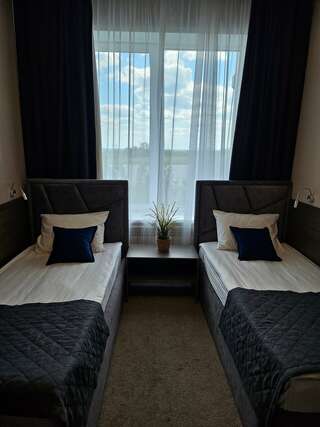 Гостиница Итиль Переволоки Стандартный трехместный номер-1